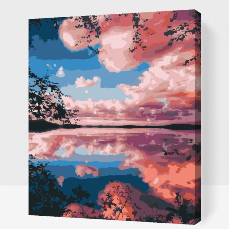 Måla efter nummer-tavla med rosa himmel över landskap eller stad