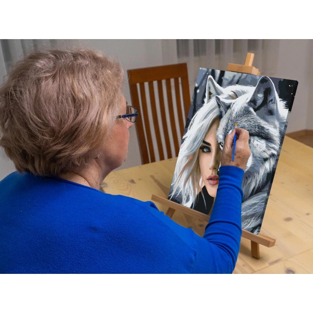 Måla efter nummer tavla med kraftfull varg och kvinna